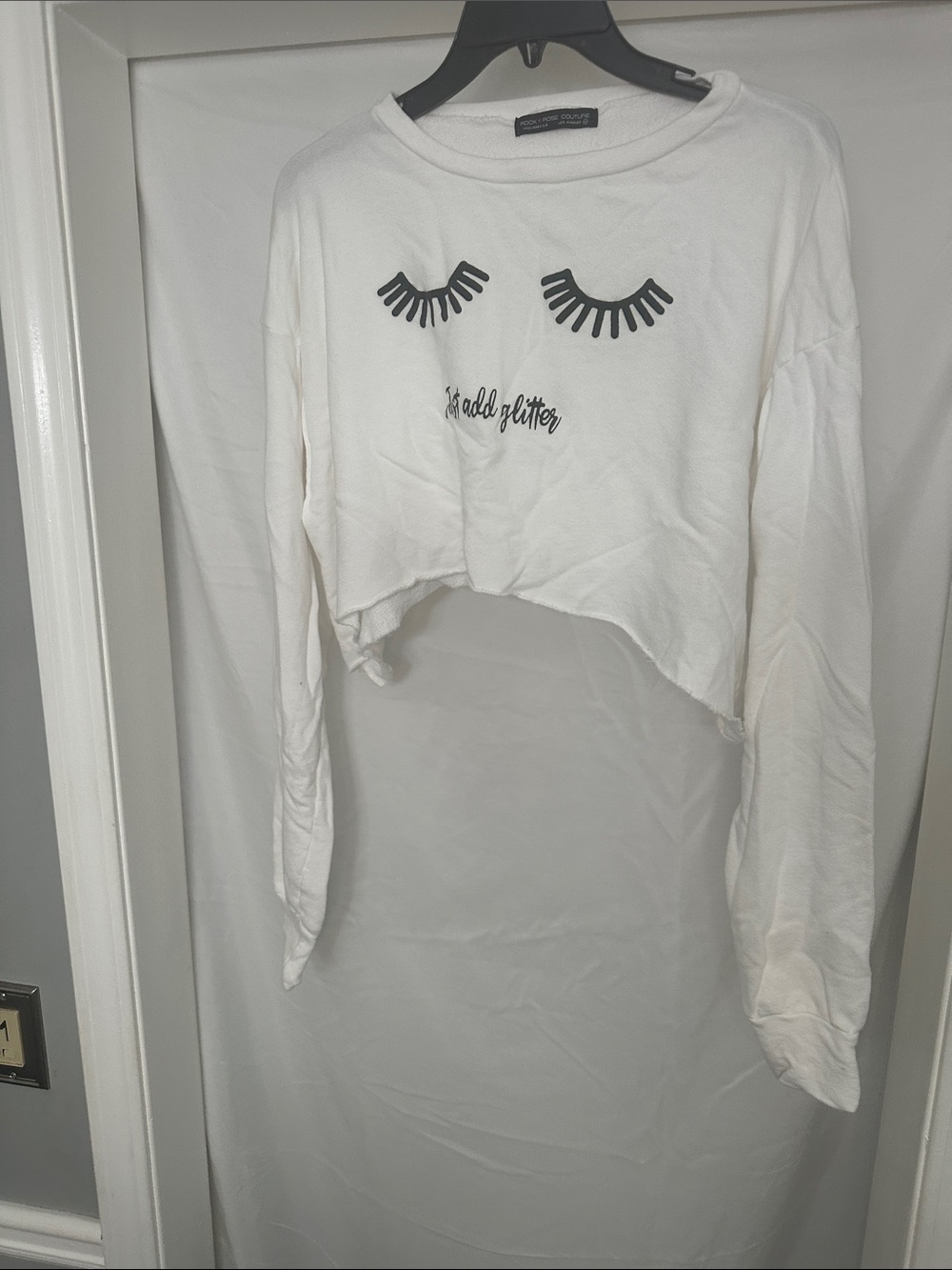 White Cropped Graphic Long-Sleeve Sweatshirt with Eyelash Motif